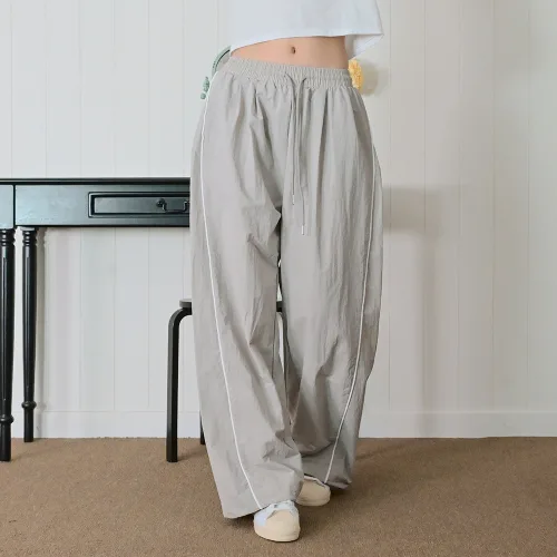 데일리진 남녀고용 바스락 절개 와이드 바지 투웨이 밑단 조절 스트링 나일론 조거 팬츠 ( 2단기장 )